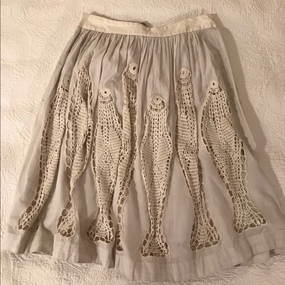 Beautiful gray skirt.